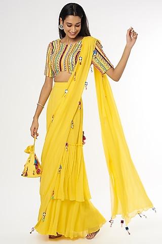 yellow tasseled skirt saree set with potli bag