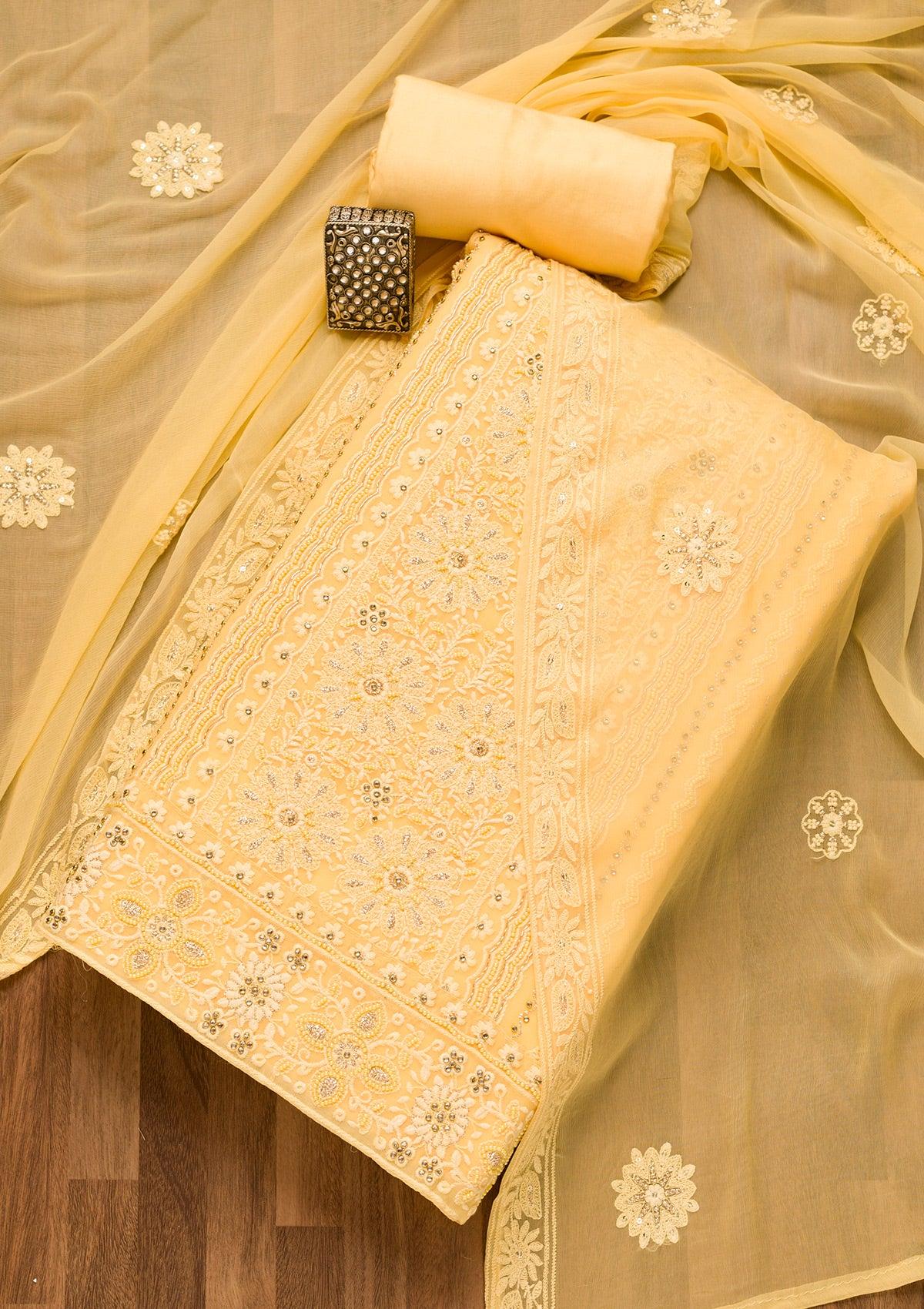 yellow threadwork georgette unstitched salwar suit