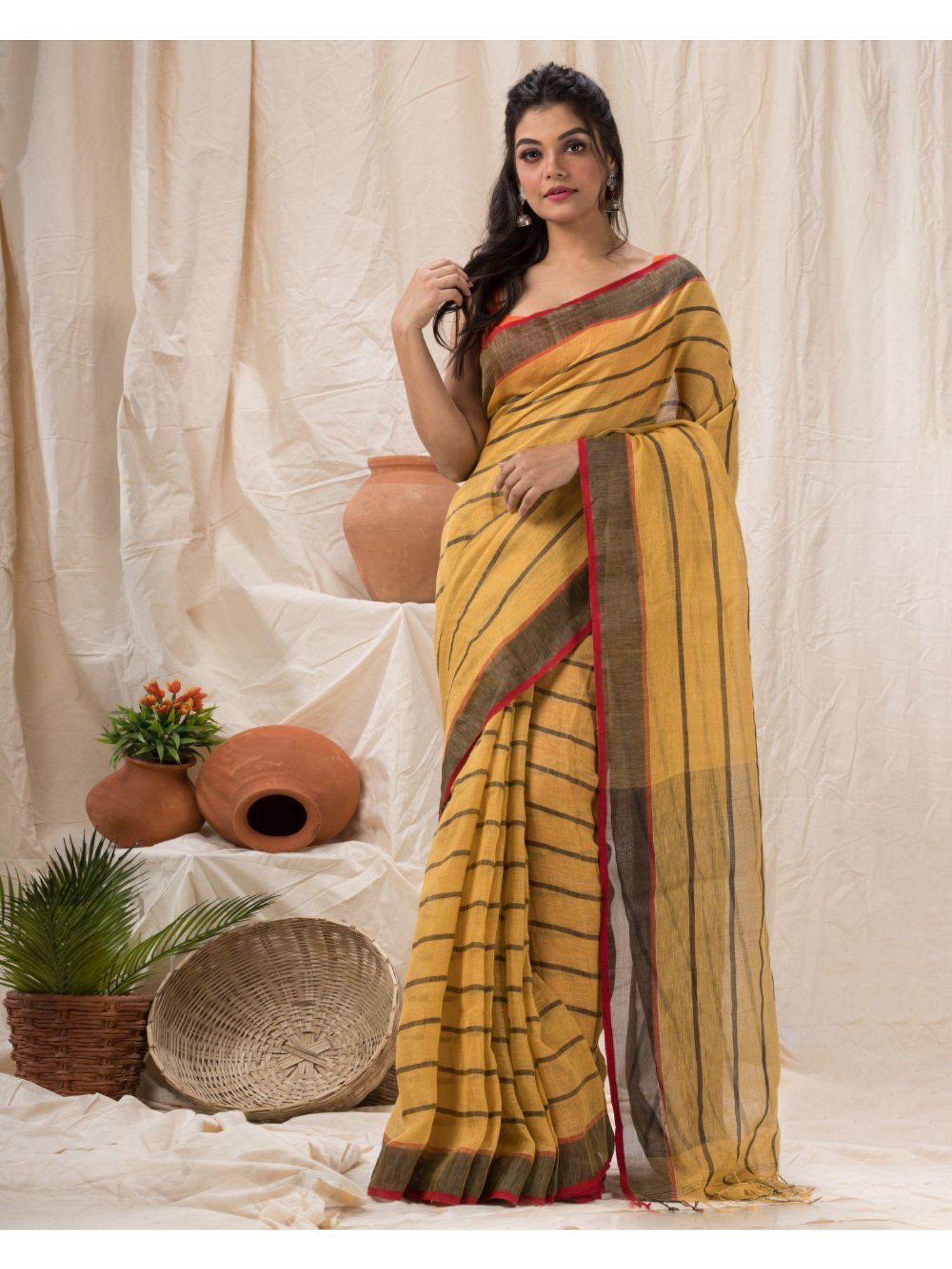 yellow traditional linen saree with unstitched blouse