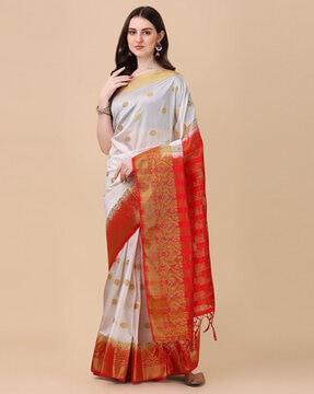 zari woven saree with tassels