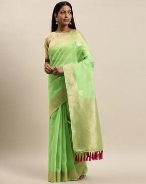 zari woven saree with tassels