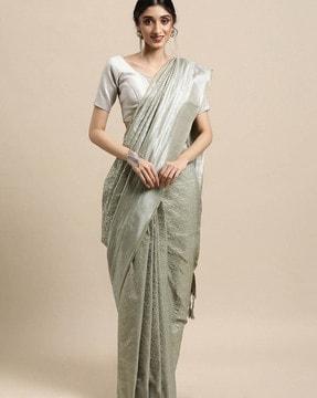 zari woven saree with tassels