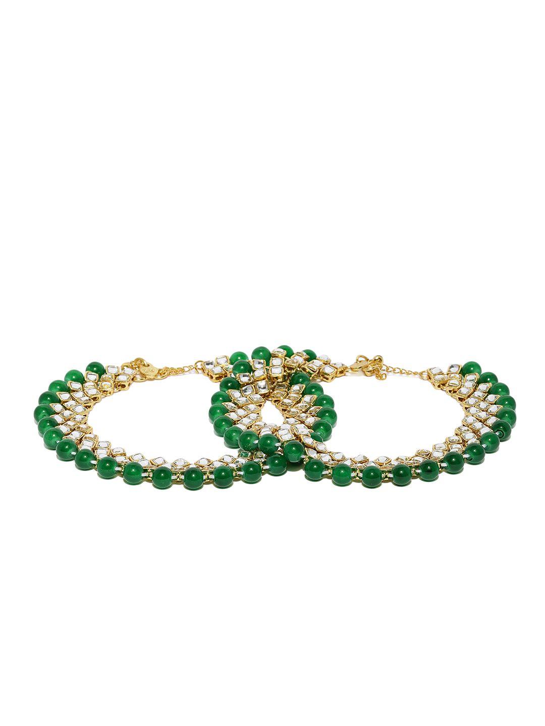 zaveri pearls gold-toned & green kundan & pearls studded anklets