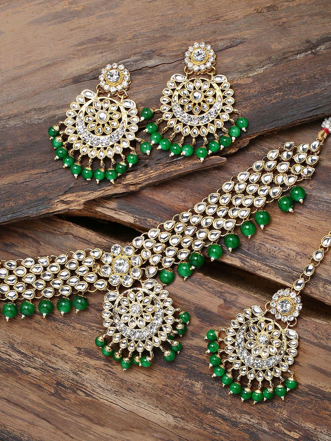 zaveri pearls gold-toned & green kundan studded jewellery set