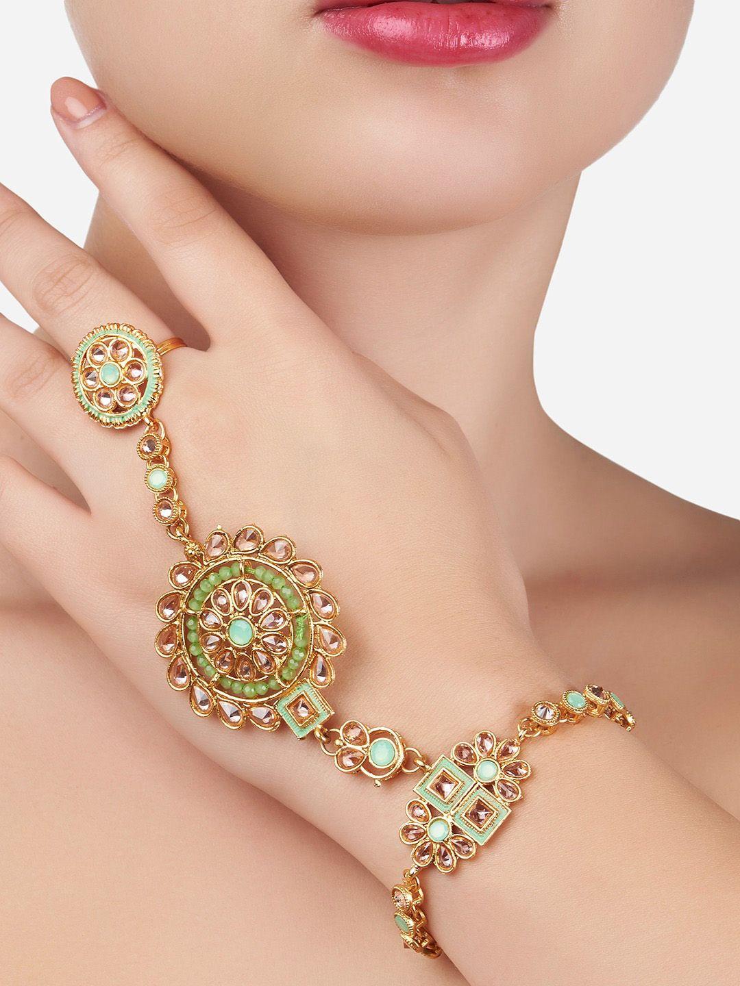 zaveri pearls women gold-toned & green gold-plated stones studded ring bracelet