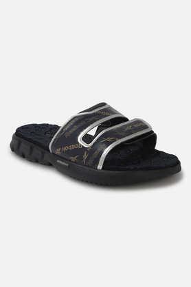 zen kick u synthetic slip-on unisex slippers - black