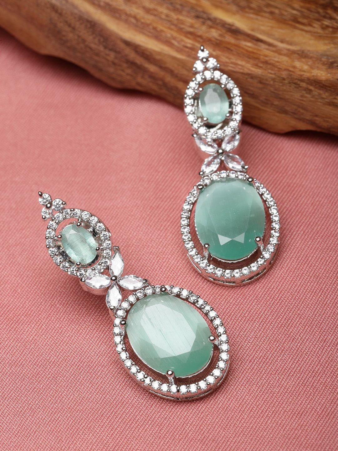 zeneme rhodium-plated american diamond studded oval shaped drop earrings