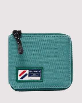 zip-around wallet with brand applique