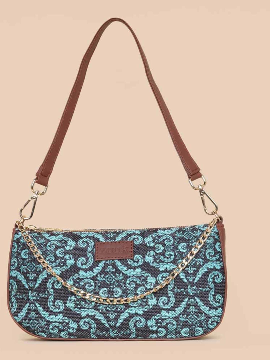 zouk ethnic motifs printed structured baguette bag handbags