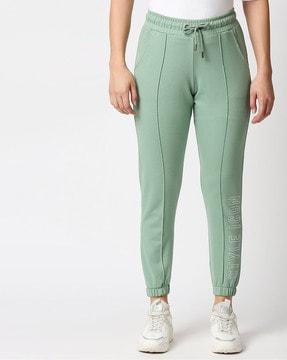 mid-rise-panelled-slim-fit-jogger-jeans-with-elasticated-drawstring-waist