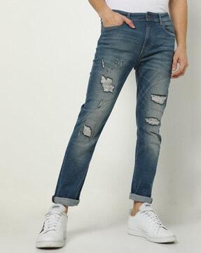 lightly-washed-distressed-slim-fit-jeans