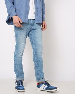heavily-washed-distressed-slim-fit-jeans