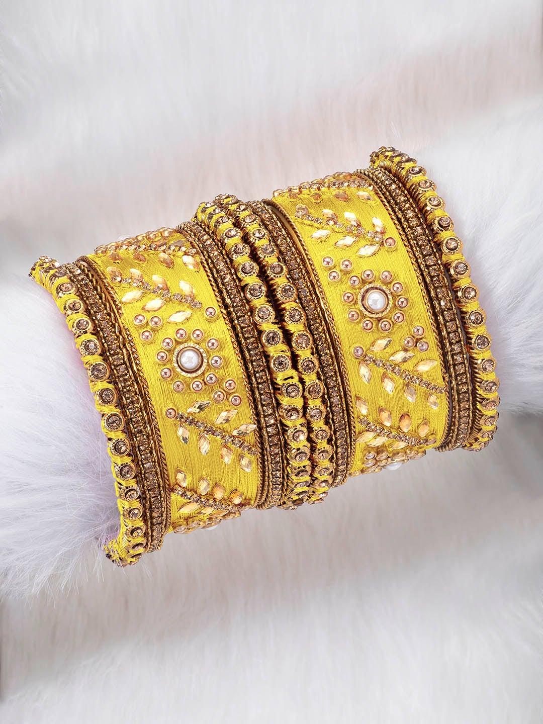 peora-set-of-10-gold-plated-&-yellow-silk-thread-handcrafted-kundan-bangles