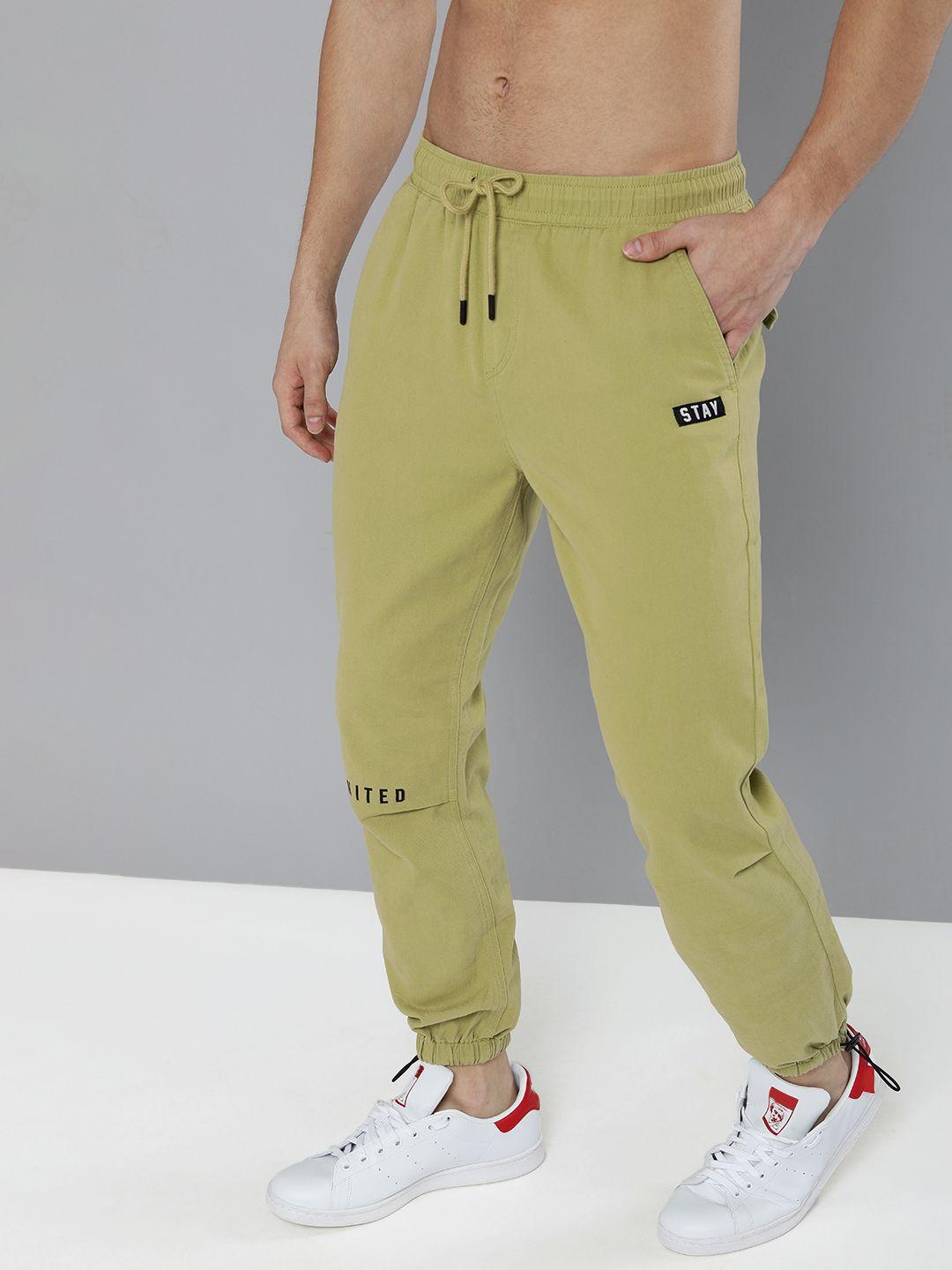 here&now-men-olive-green-&-black-printed-joggers