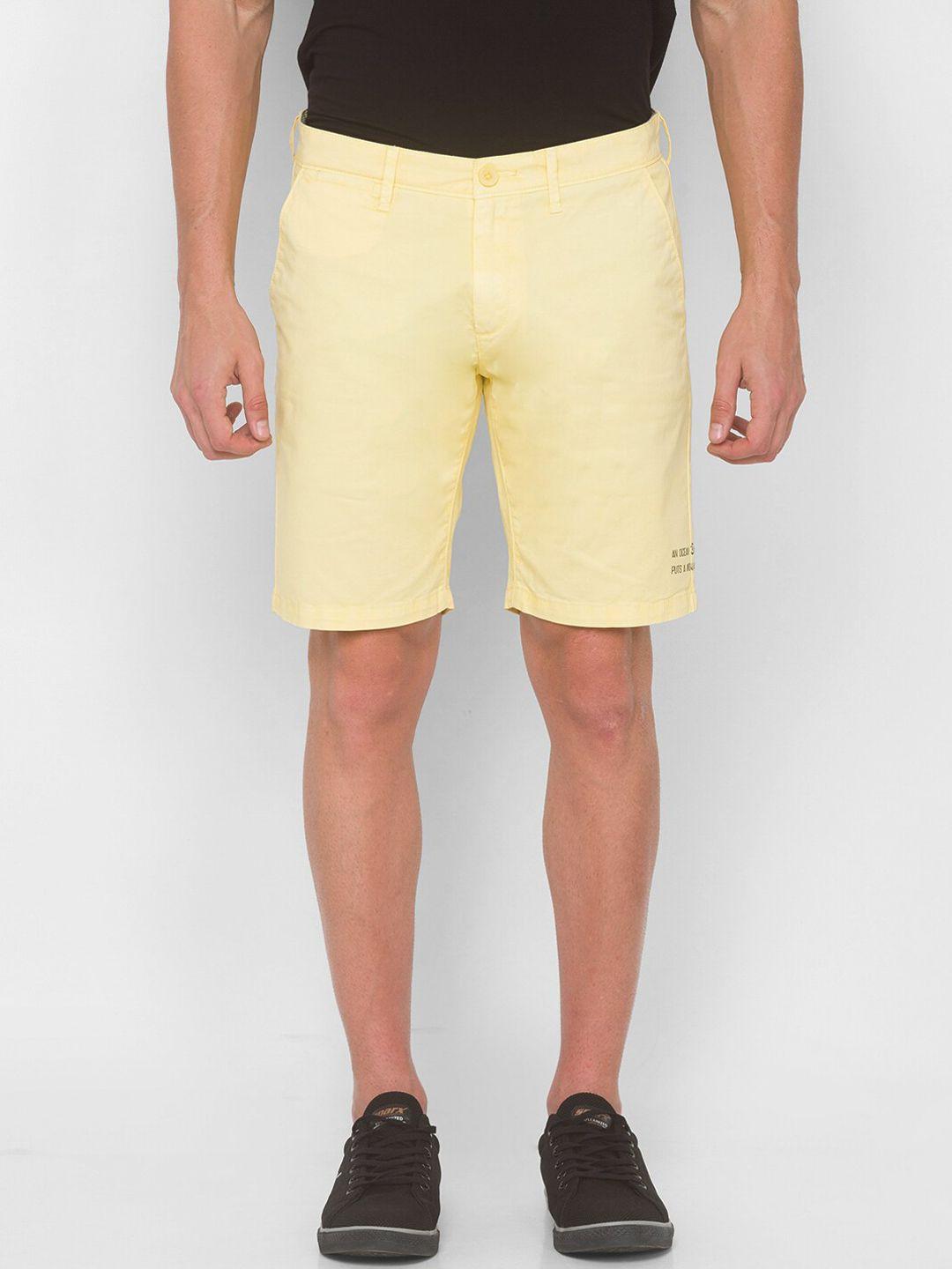 spykar-men-yellow-solid-mid-rise-shorts