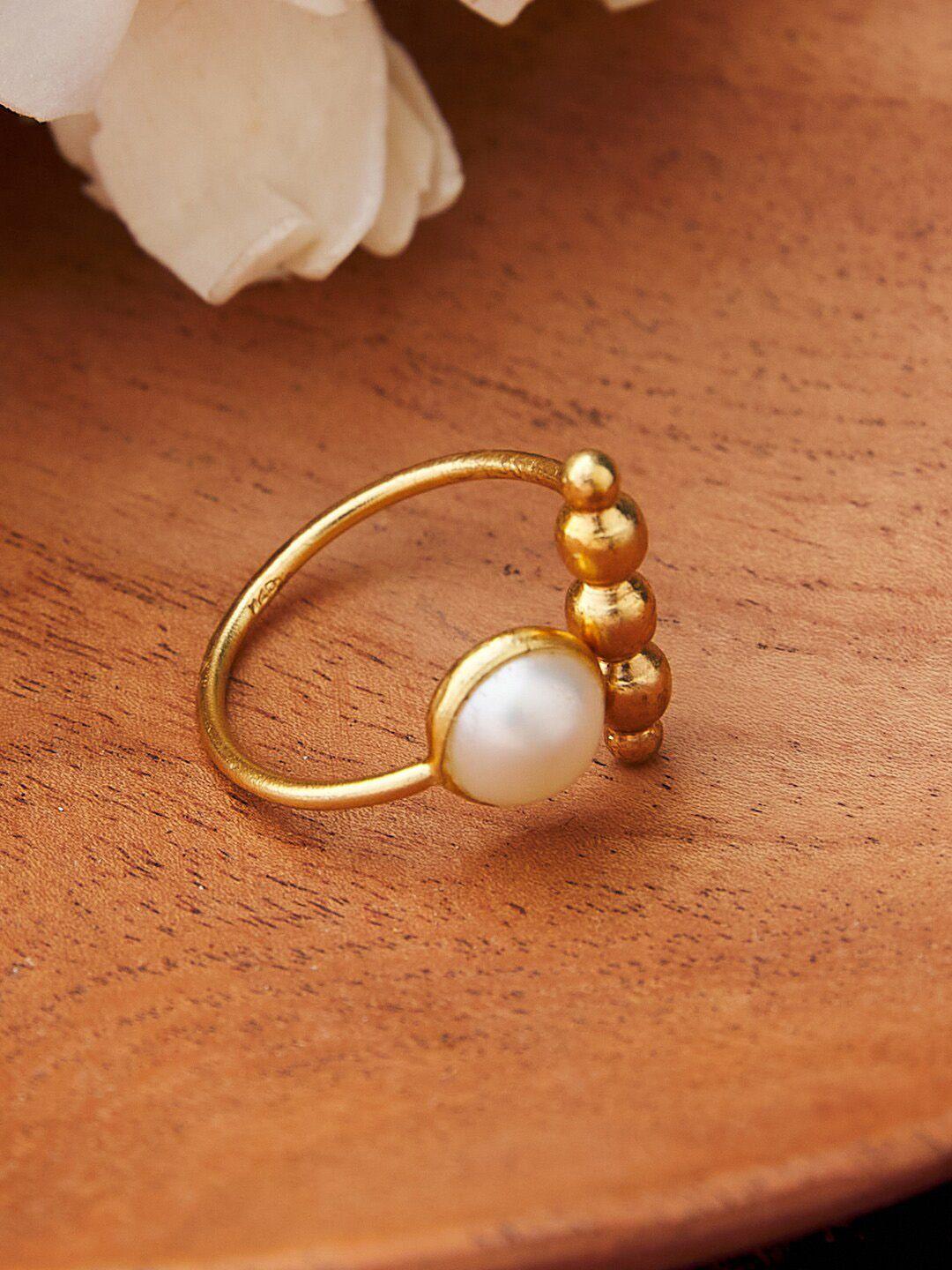 fabindia-women-gold-plated-&-toned-white-artificial-beaded-studded-adjustable-finger-ring