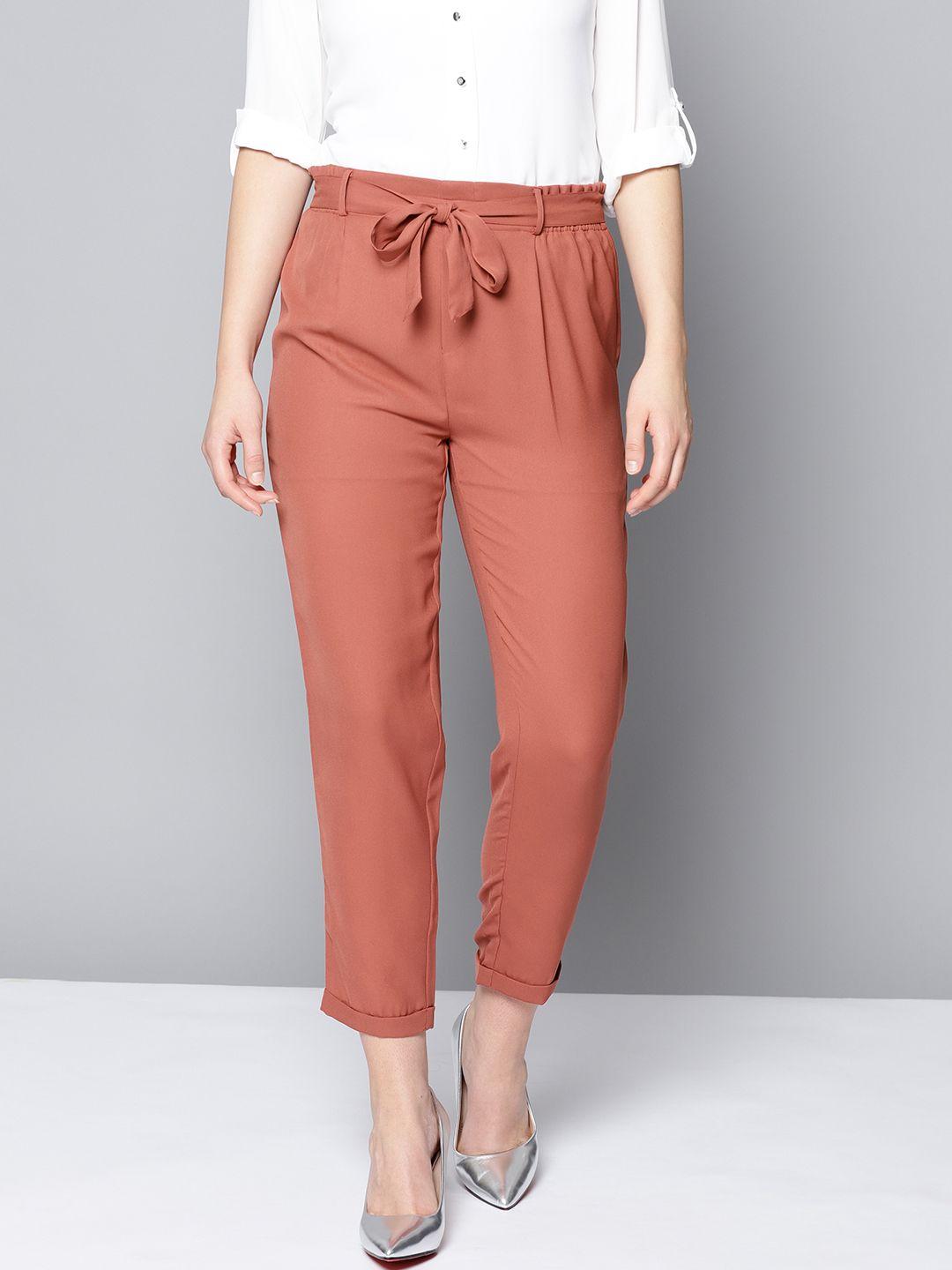 besiva-women-rust-orange-loose-fit-belted-peg-trousers