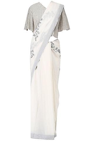 off-white-embroidered-calico-saree-with-striped-blouse