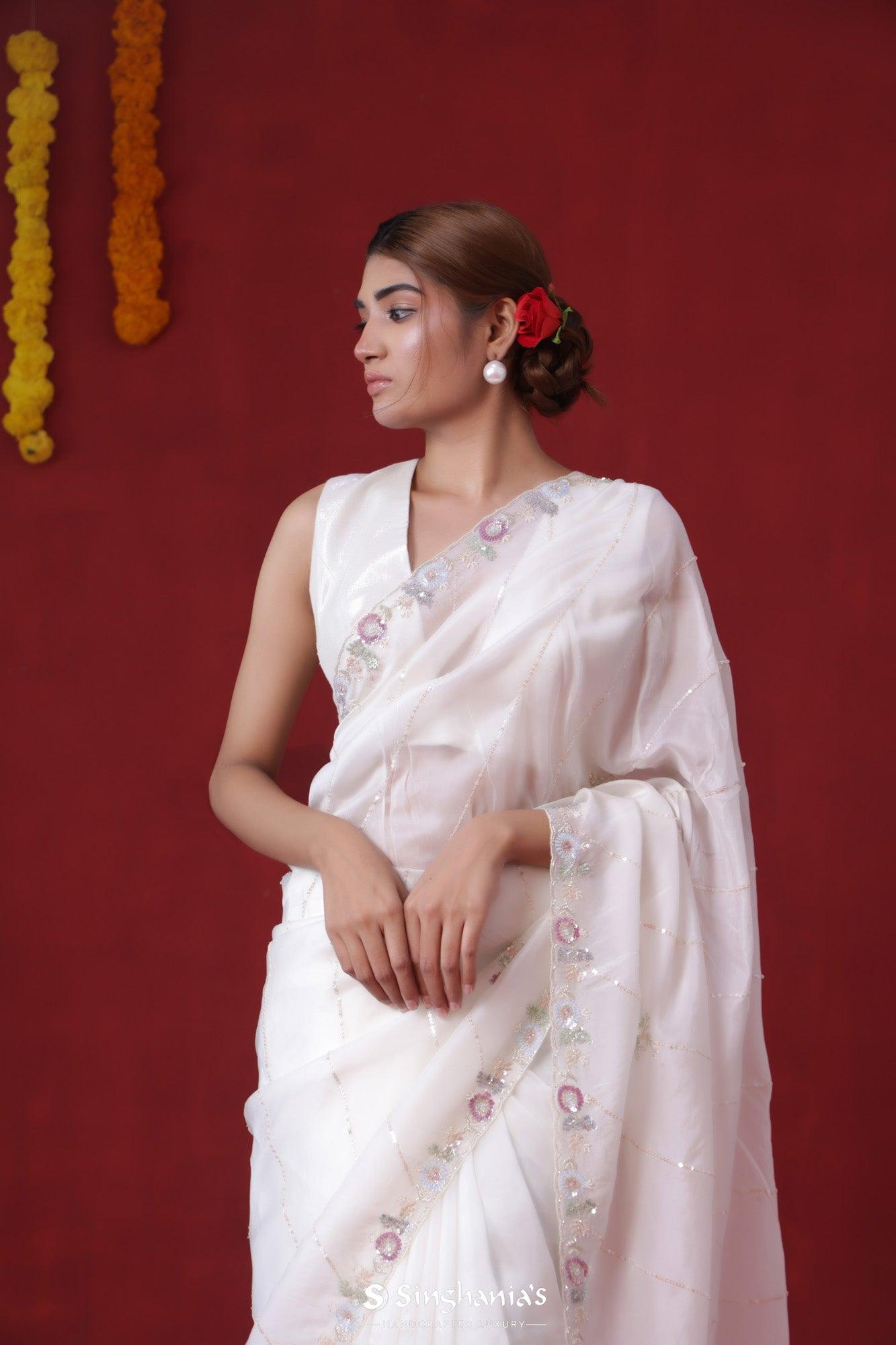 dull-white-organza-saree-with-hand-embroidery