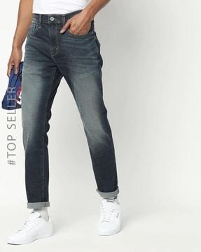 286 Slater Mid-Wash Slim Tapered Jeans