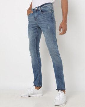 Lightly Washed Distressed Skinny Jeans