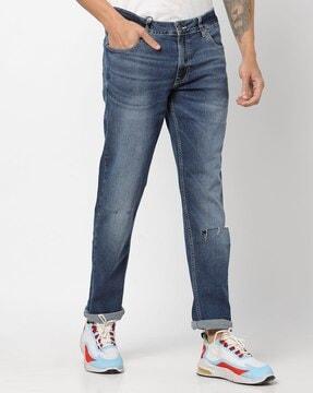 Heavily Washed Distressed Slim Fit Jeans