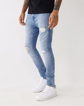 Heavily Washed Mild Distressed Skinny Fit Jeans
