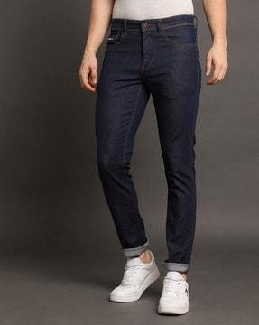 Lightly Washed Tapered Fit Jeans