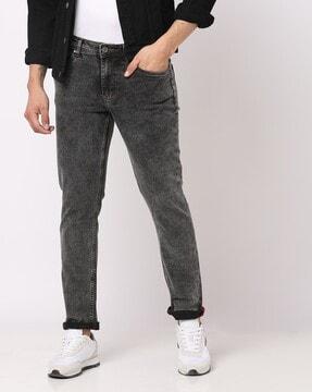 Heavy-Wash Tapered Fit Low-Rise Jeans