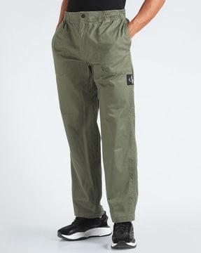 men-badge-trim-woven-regular-fit-pleated-pants