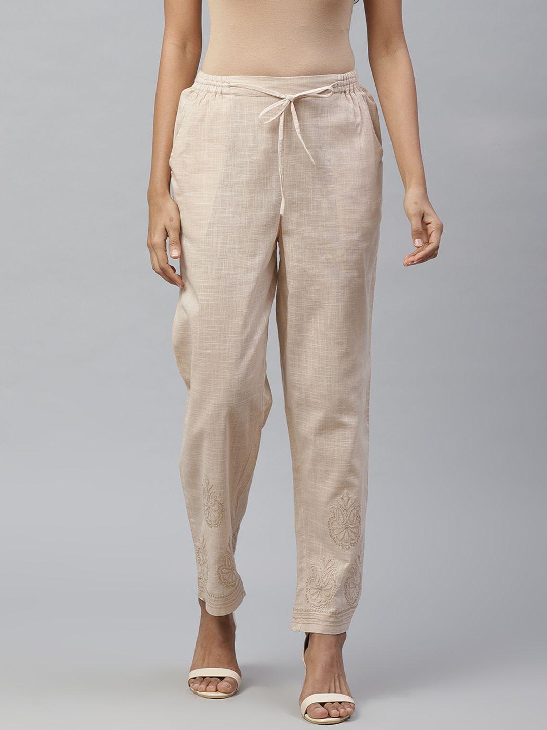 akheri-women-beige-tapered-fit-embroidered-detail-regular-trousers