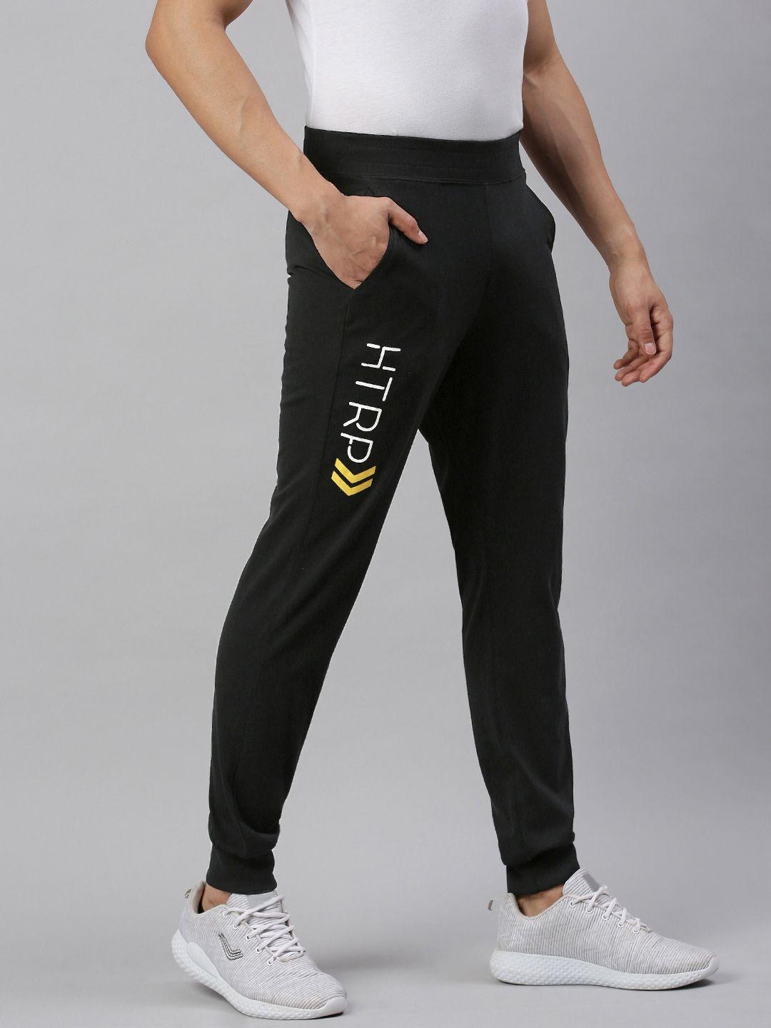 huetrap-men-black-solid-straight-fit-sustainable-joggers-with-printed-detail