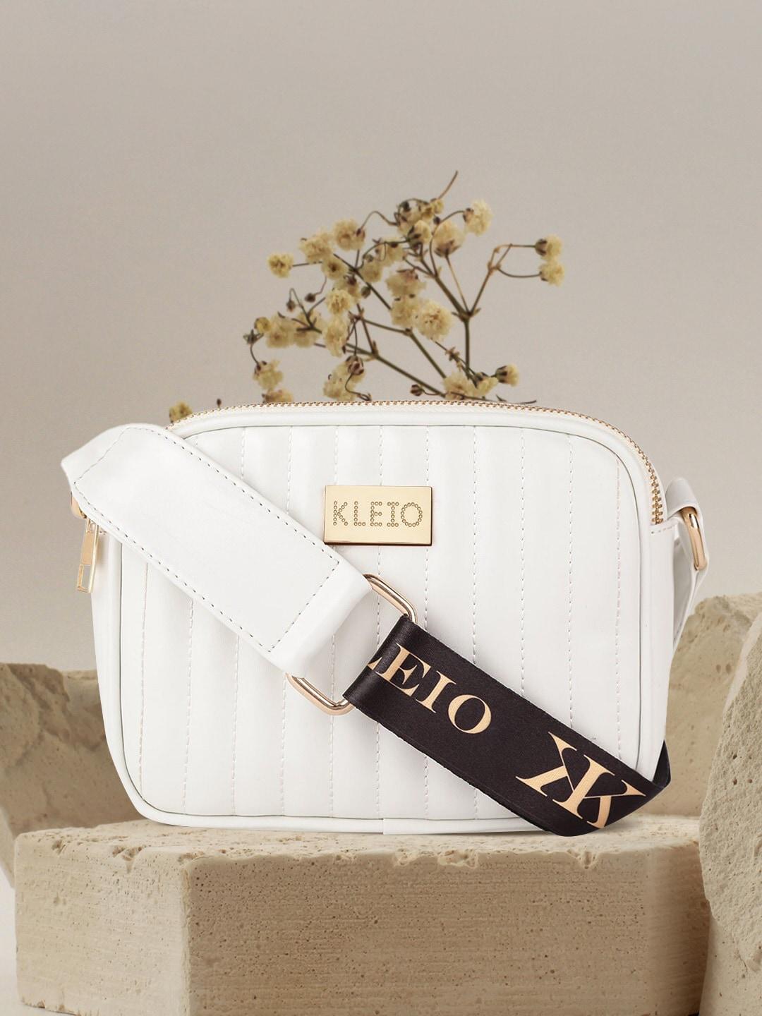 KLEIO White PU Structured Sling Bag with Tasselled