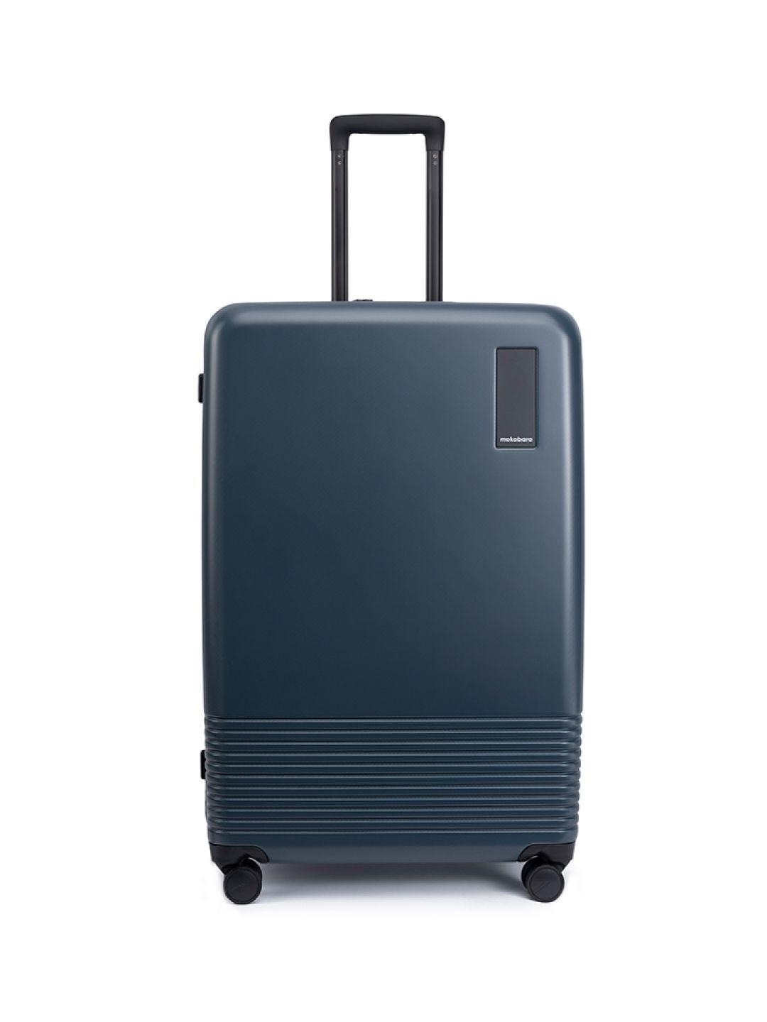 mokobara-navy-blue-textured-hard-sided-large-trolley-suitcase