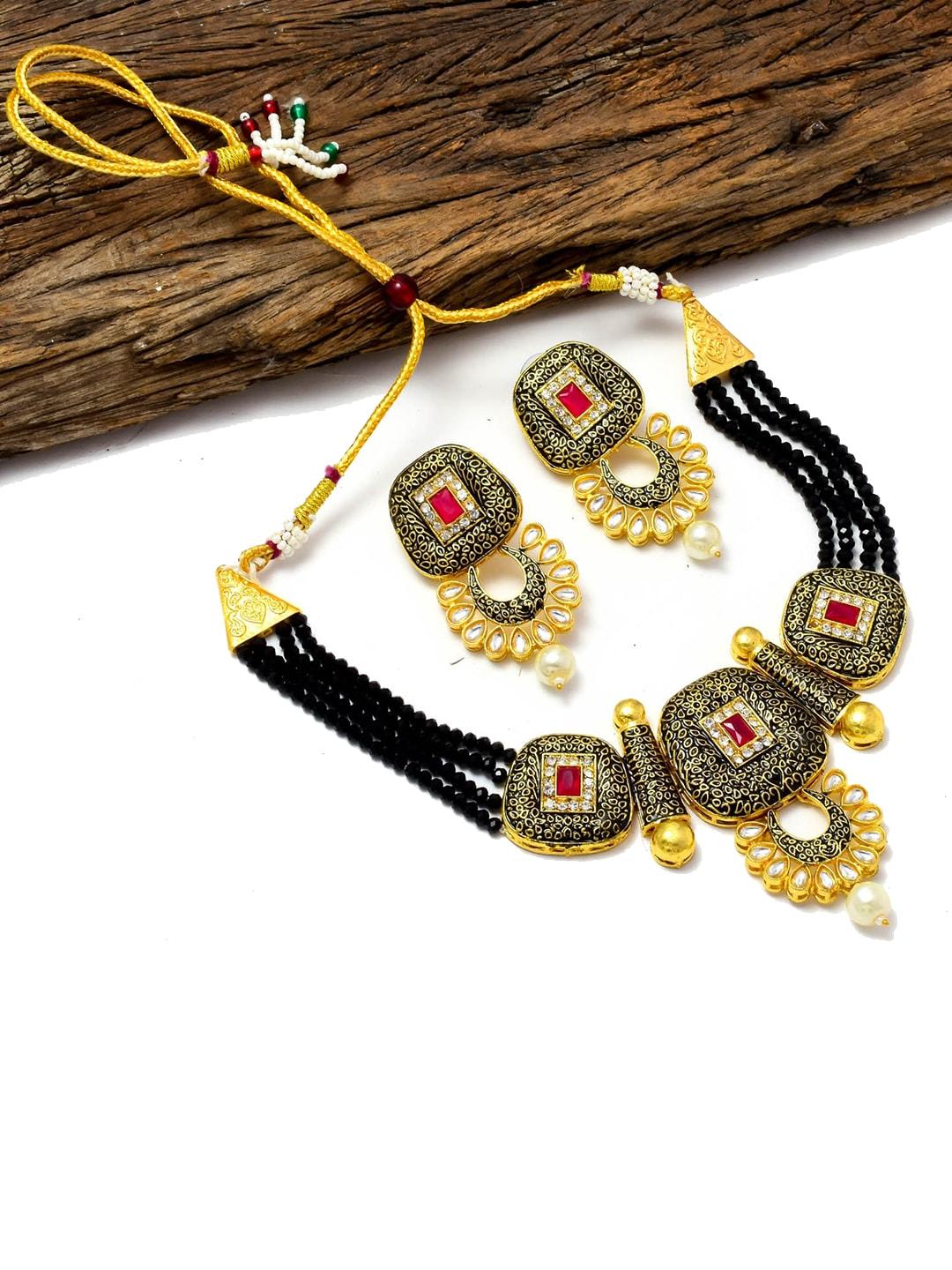 Jewar Mandi Gold-Plated White & Black Stone-Studded & Pearl Beaded Jewellery Set