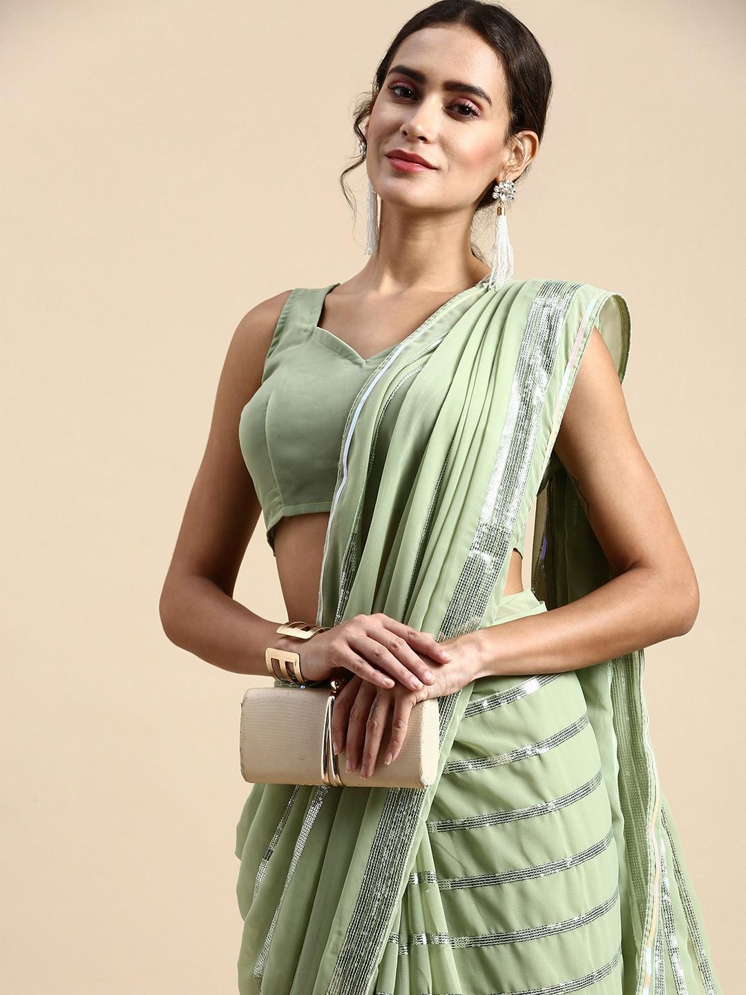 VAIRAGEE Striped Sequinned Poly Georgette Saree