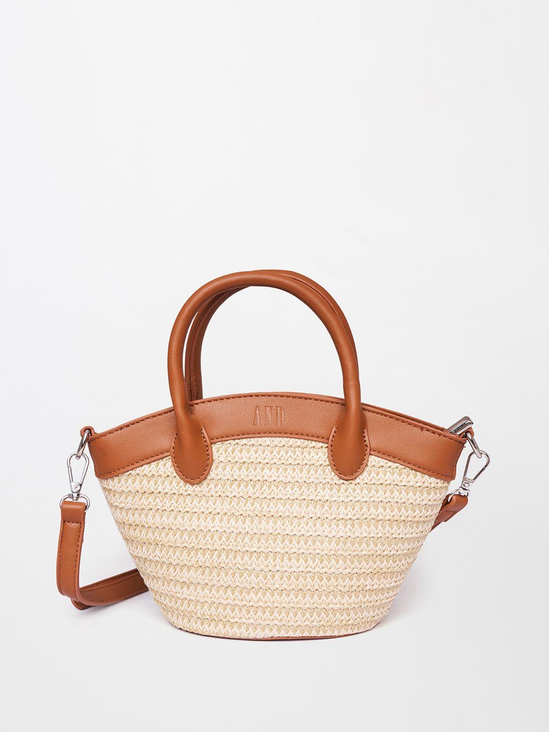 and-textured-structured-handheld-bag-with-tasselled