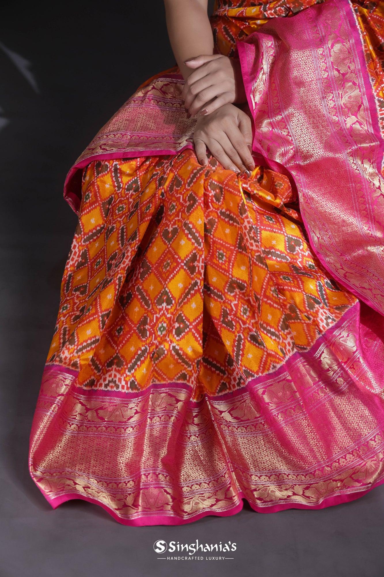 yellow-orange-ikkat-silk-saree-with-kanjivaram-border